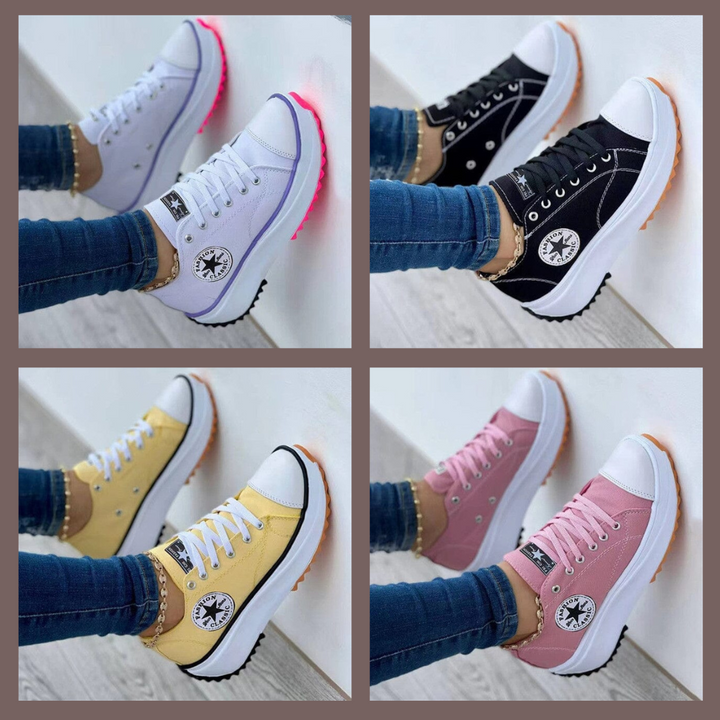 Women's low-top lace-up sneakers with platform soles and side patches