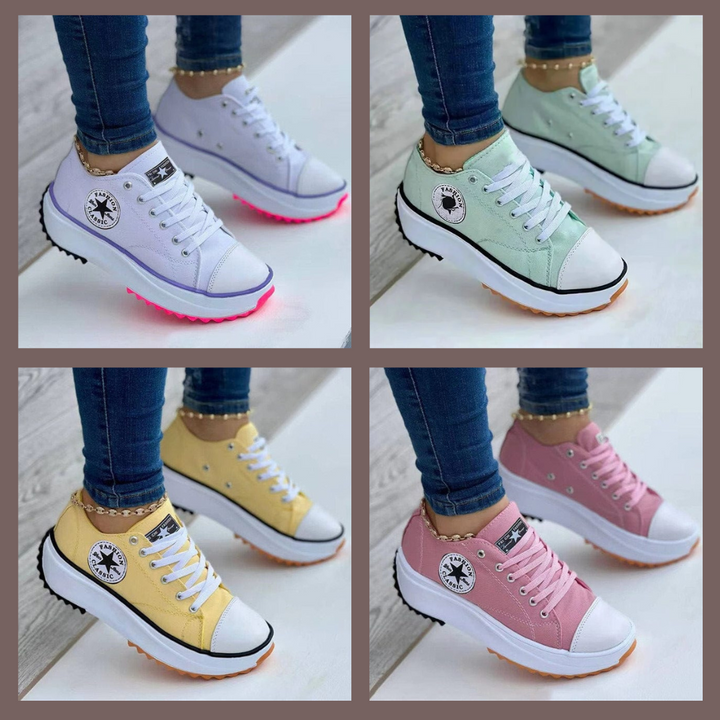 Women's low-top lace-up sneakers with platform soles and side patches