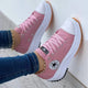 Women's low-top lace-up sneakers with platform soles and side patches