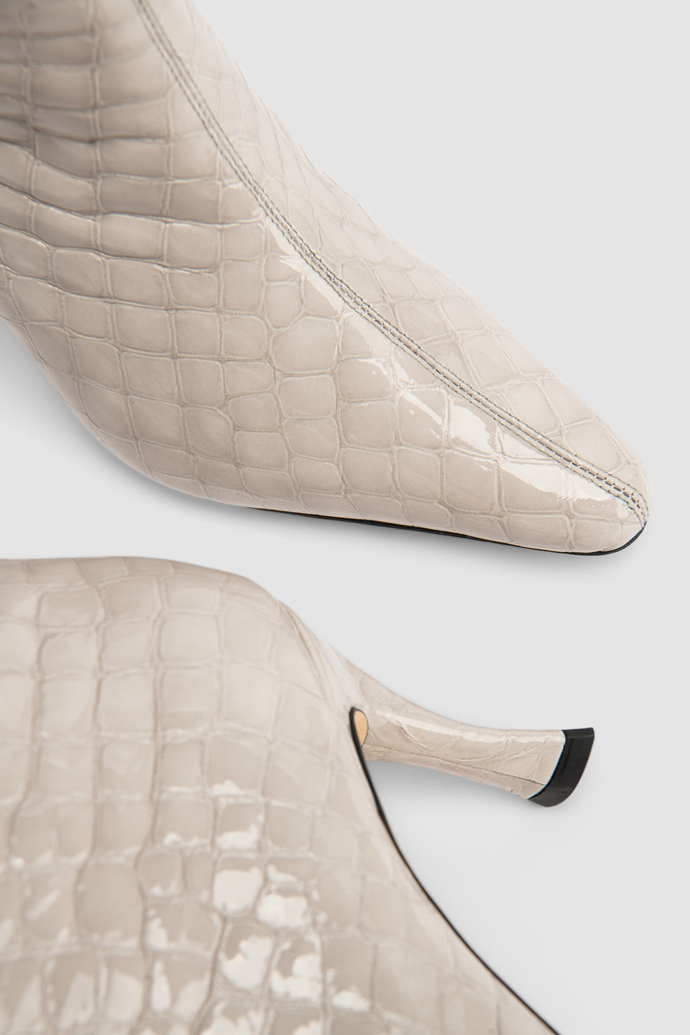Women's beige croco embossed knee-high boots with pointed toes and stiletto heels