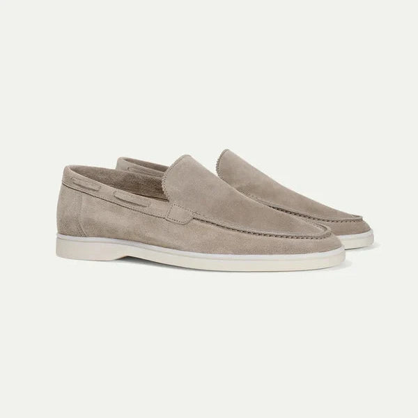 Men's slip-on loafers with moc toe stitching and low flat soles