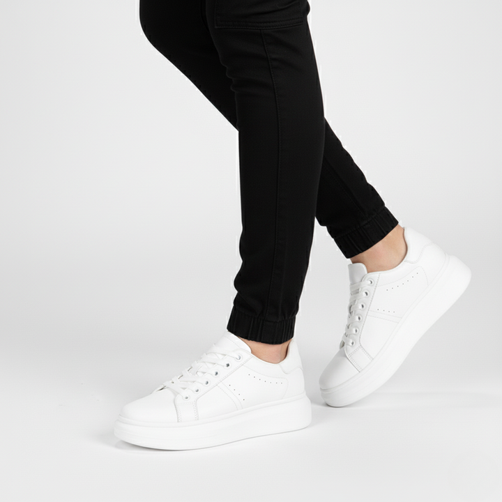 Low-top platform sneakers with lace-up closure and panel detailing
