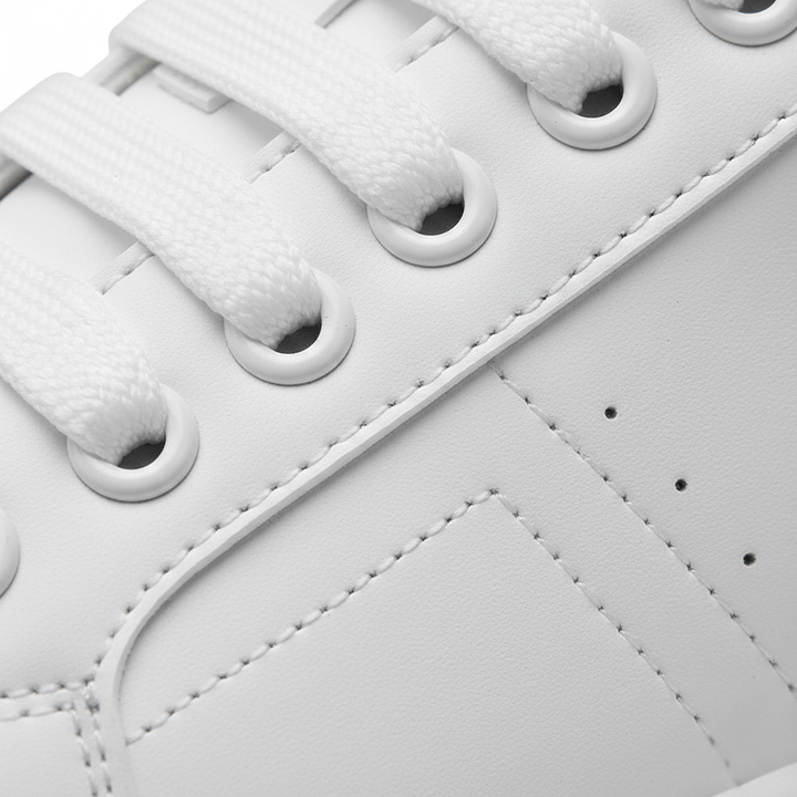 Low-top platform sneakers with lace-up closure and panel detailing