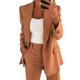 Women's tailored blazer and straight-leg trousers set with notched lapels and flap pockets