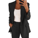 Women's tailored blazer and straight-leg trousers set with notched lapels and flap pockets
