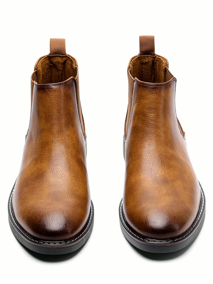 Chelsea ankle boots with elastic side panels, almond toes and low heels