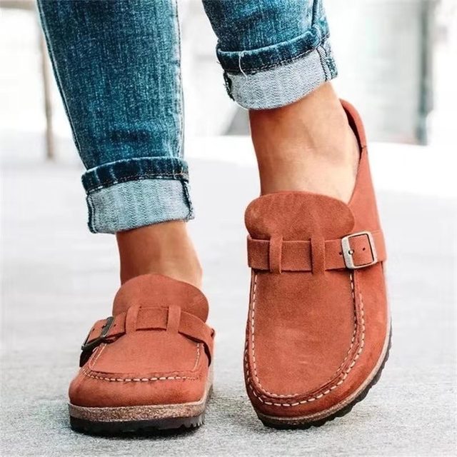 Women's slip-on loafers with buckle straps, rounded toes and flat soles