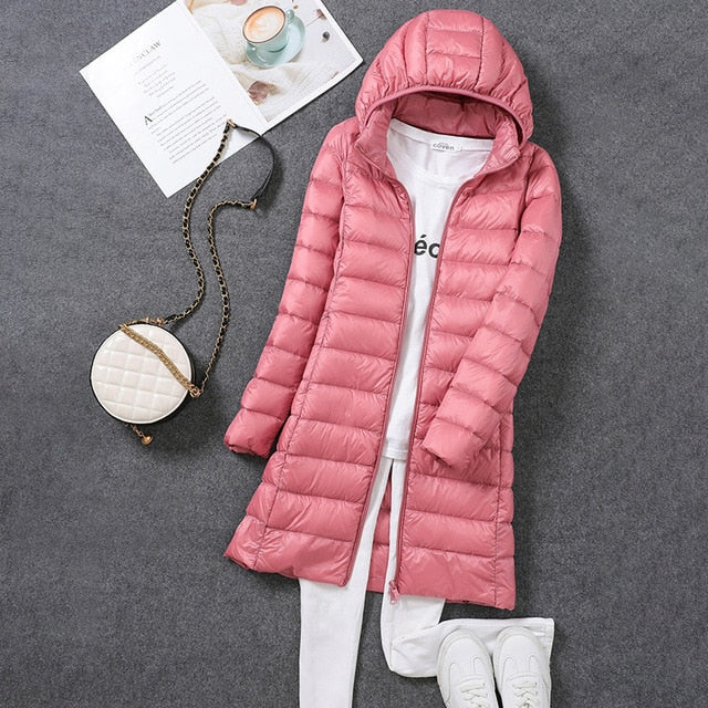 Women's longline quilted puffer coat with hood and front zipper