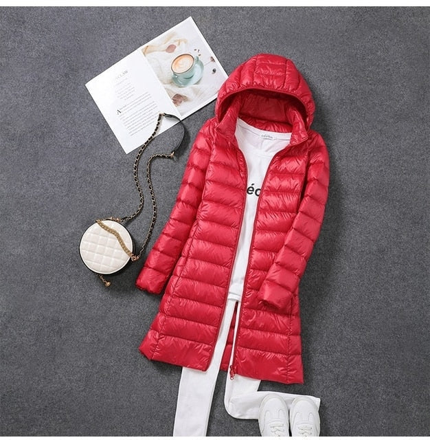 Women's longline quilted puffer coat with hood and front zipper