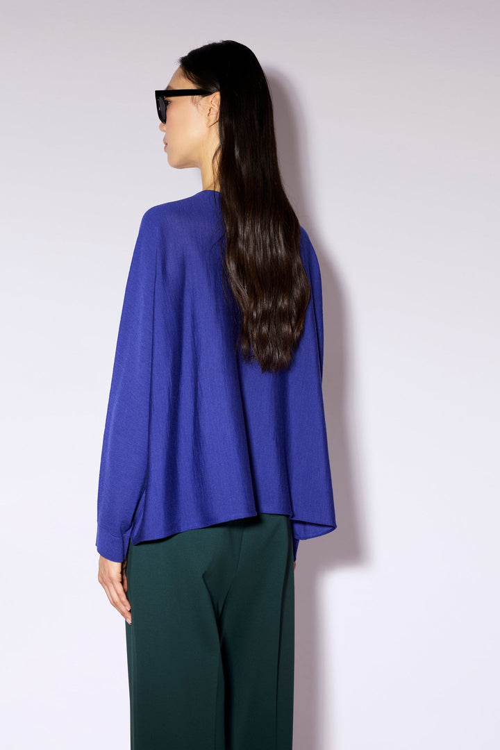 Women's long-sleeve button cardigan with a round neckline and hip-length hem