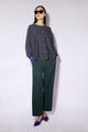 Women's long-sleeve button cardigan with a round neckline and hip-length hem