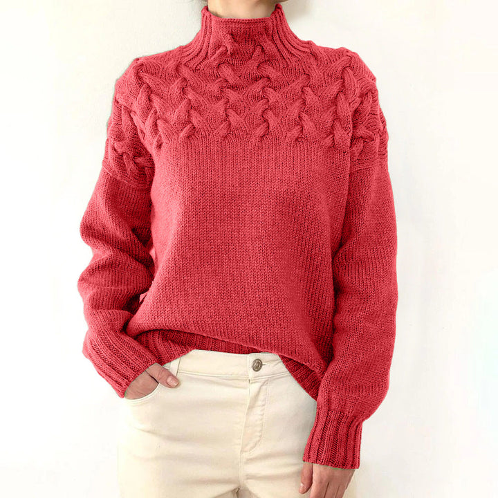 Women's cable knit turtleneck sweater with long sleeves and ribbed trims