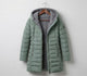 Women's quilted hooded coat with long sleeves and zip pockets