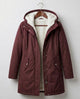 Women's long hooded parka with lined interior and flap pockets