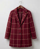 Women's long checked coat with notch lapel and side pockets