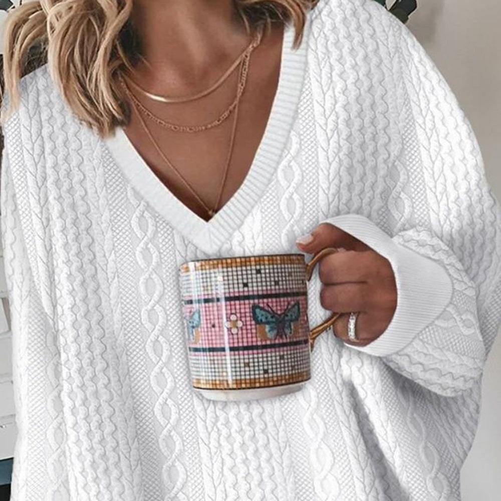 Women's white cable-knit V-neck jumper with long sleeves and ribbed trims