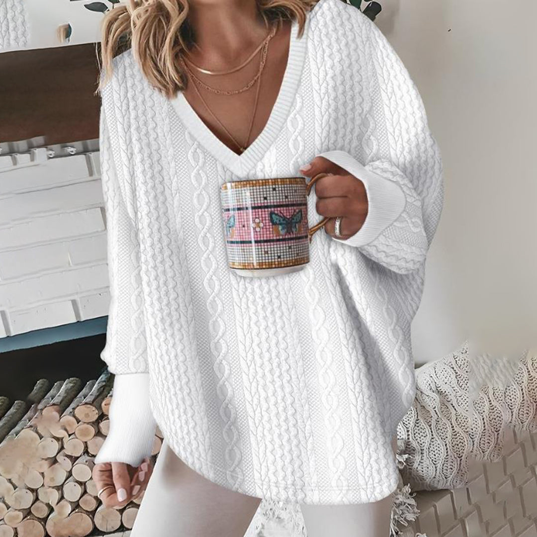 Women's white cable-knit V-neck jumper with long sleeves and ribbed trims
