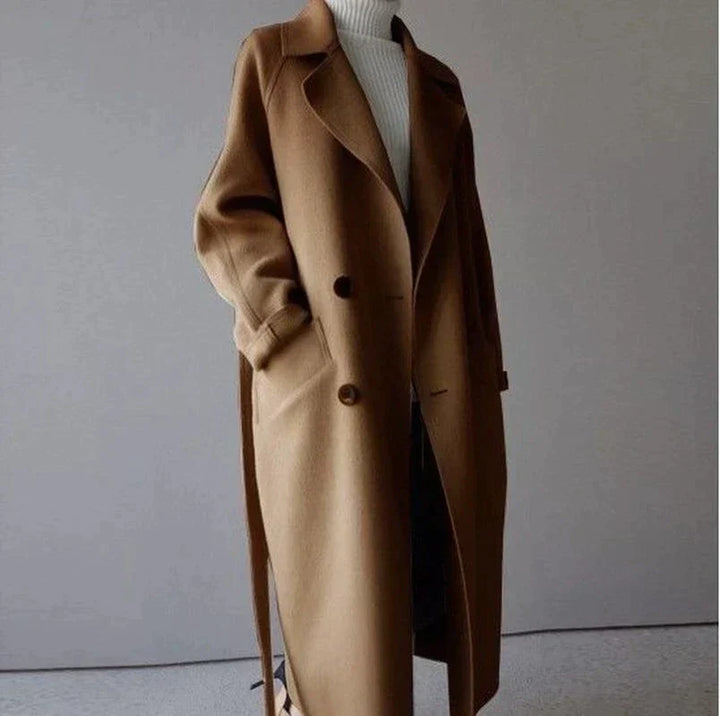 Women's longline button-front coat with notched lapels and side pockets
