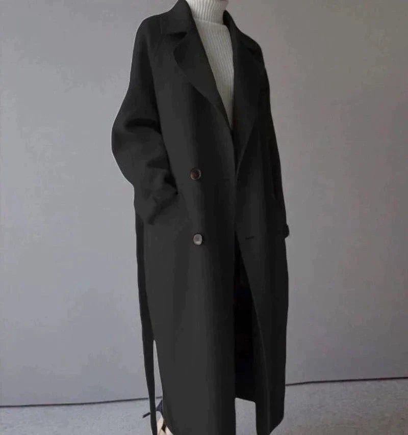 Women's longline button-front coat with notched lapels and side pockets