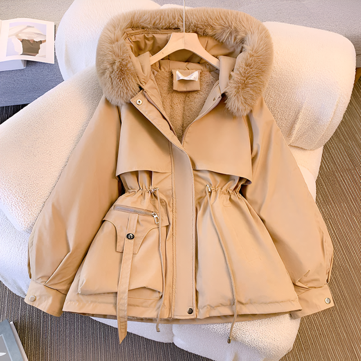 Women's hooded winter coat with fluffy trimmed hood and drawstring waist