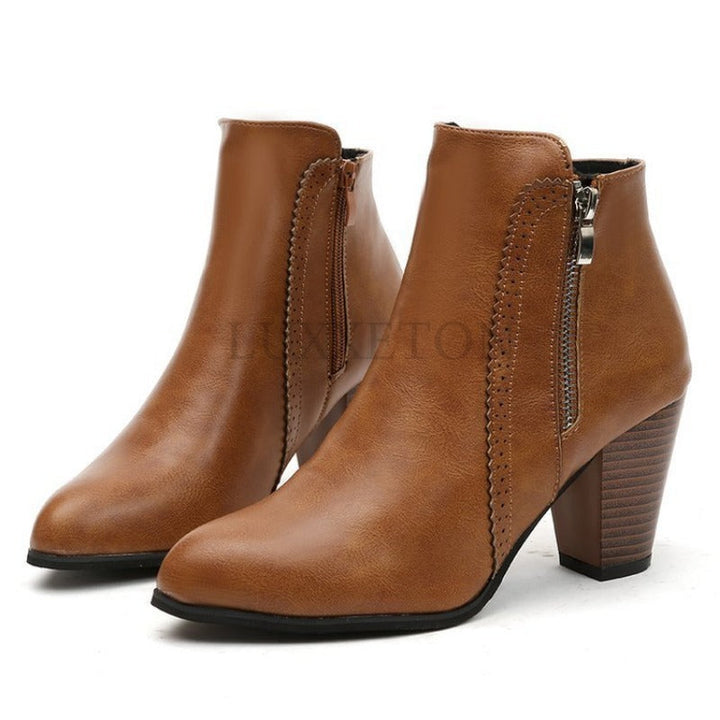 Women's heeled ankle boots with pointed toe, side zipper and high block heel