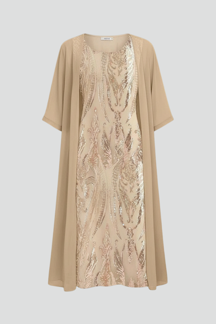 Woman wearing a beige sequin midi dress with attached cape sleeve overlay