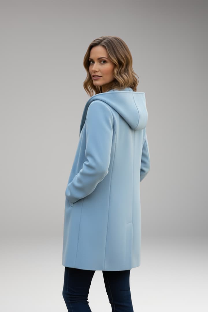 Women's long hooded coat with side pockets and concealed front closure