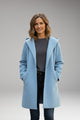 Women's long hooded coat with side pockets and concealed front closure