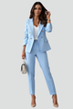 Woman wearing a black double-breasted blazer suit set with straight leg trousers