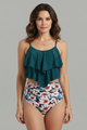 Woman wearing a black ruffle tankini top with high waist leopard print bottom