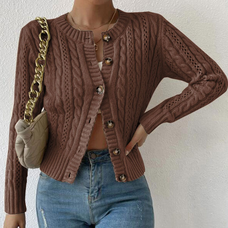 Women's cable knit button front cardigan with long sleeves and crew neckline