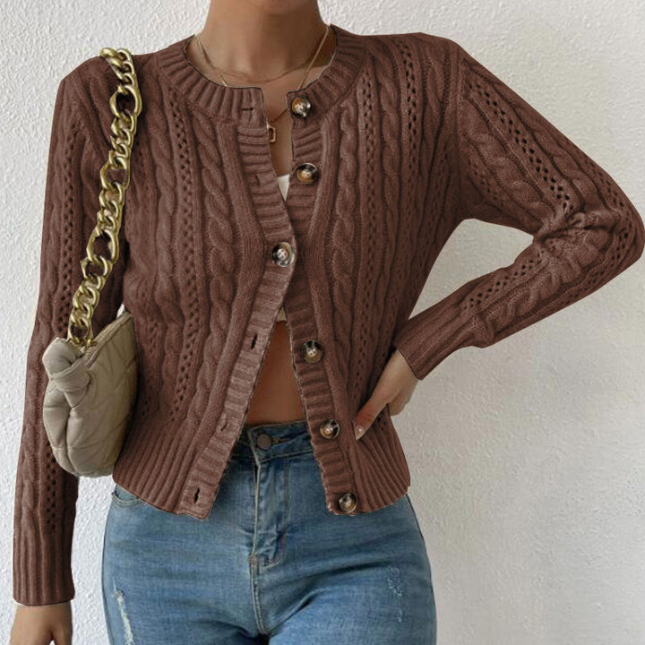 Women's cable knit button front cardigan with long sleeves and crew neckline