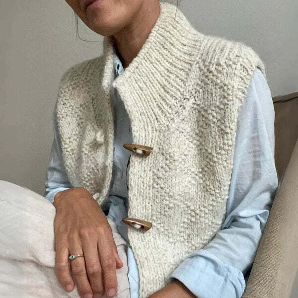 Women's white textured sleeveless cardigan vest with mock neck and button front