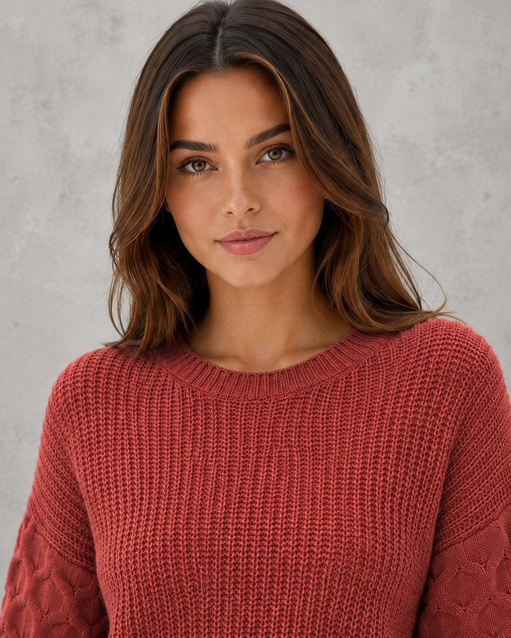 Women's textured knit sweater with lantern sleeves and crew neckline