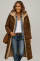 Women's longline hooded quilted puffer coat with full-length silhouette