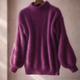 Women's oversized turtleneck sweater with long balloon sleeves and ribbed trims
