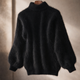 Women's oversized turtleneck sweater with long balloon sleeves and ribbed trims