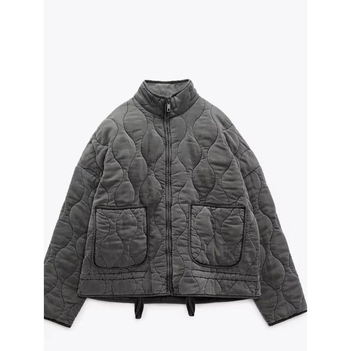 Women's quilted jacket with high collar, front zipper and patch pockets