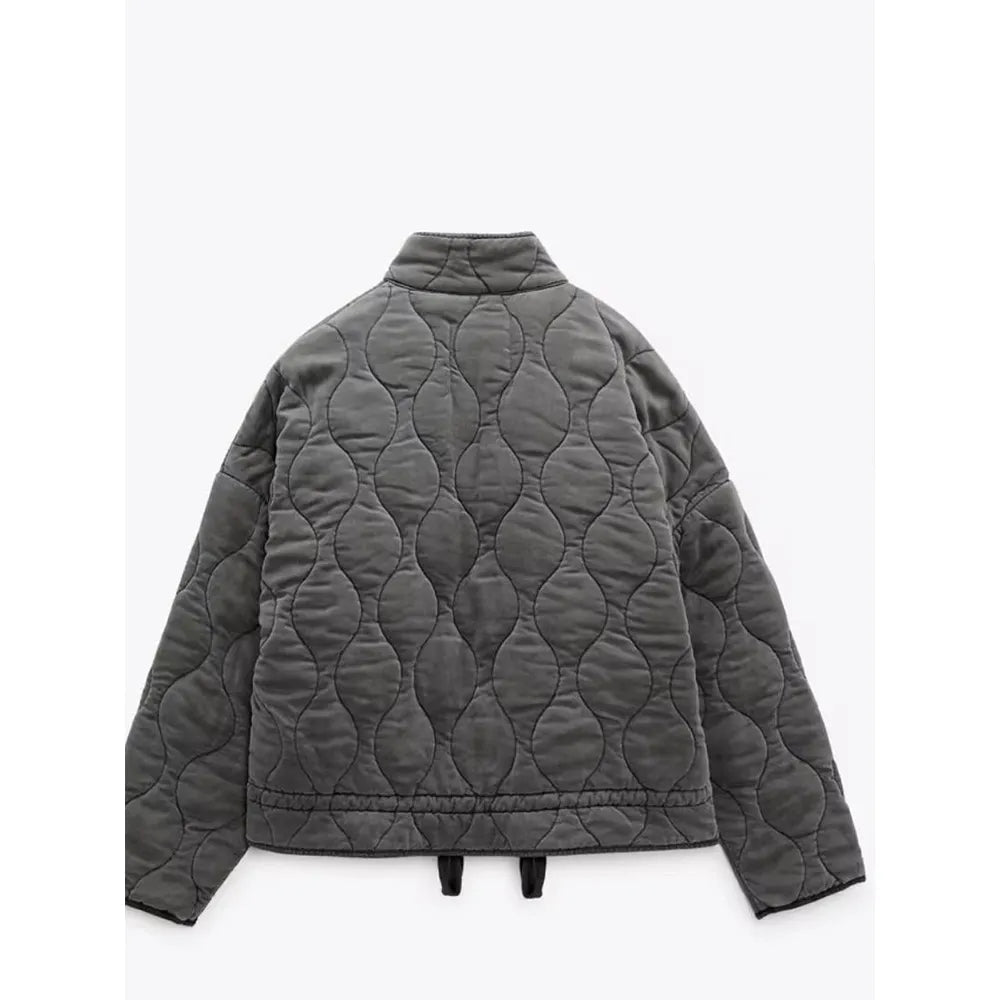 Women's quilted jacket with high collar, front zipper and patch pockets