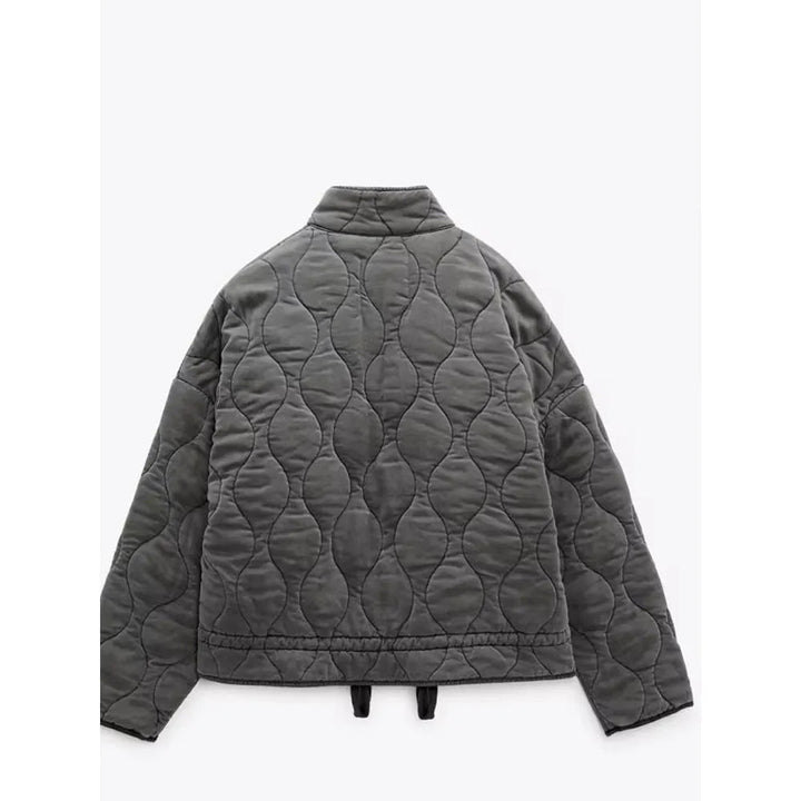 Women's quilted jacket with high collar, front zipper and patch pockets