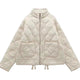 Women's quilted jacket with high collar, front zipper and patch pockets