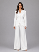 Women's tailored two-piece suit with fitted buttoned jacket and wide-leg trousers