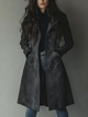 Women's long button-front trench coat with lapel collar and side pockets