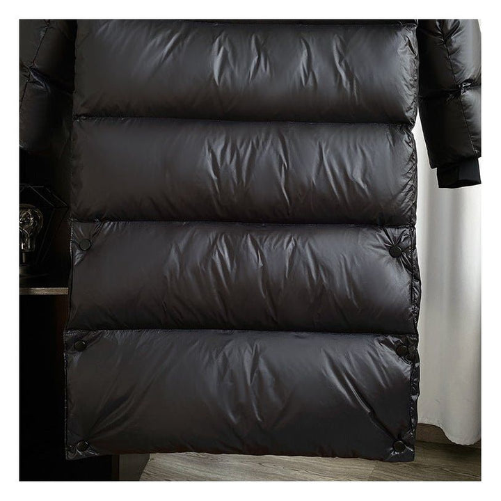 Women's black longline hooded puffer jacket with horizontal quilting
