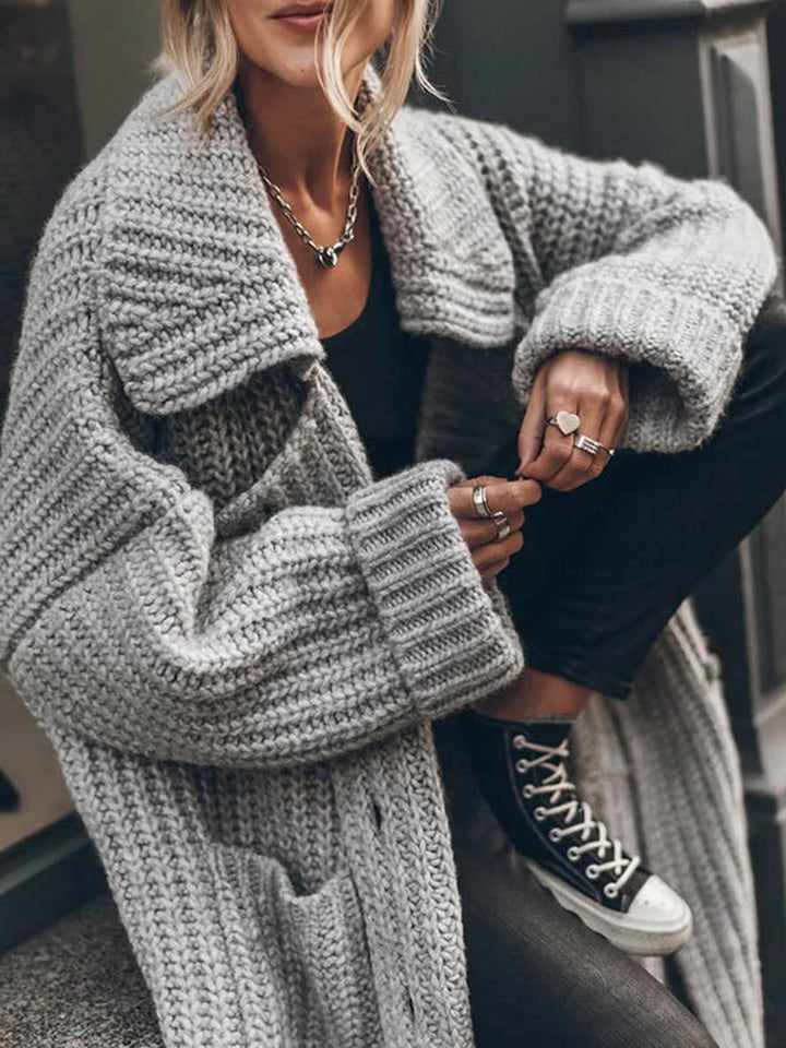 Women's oversized chunky rib-knit longline cardigan with shawl collar and front pockets