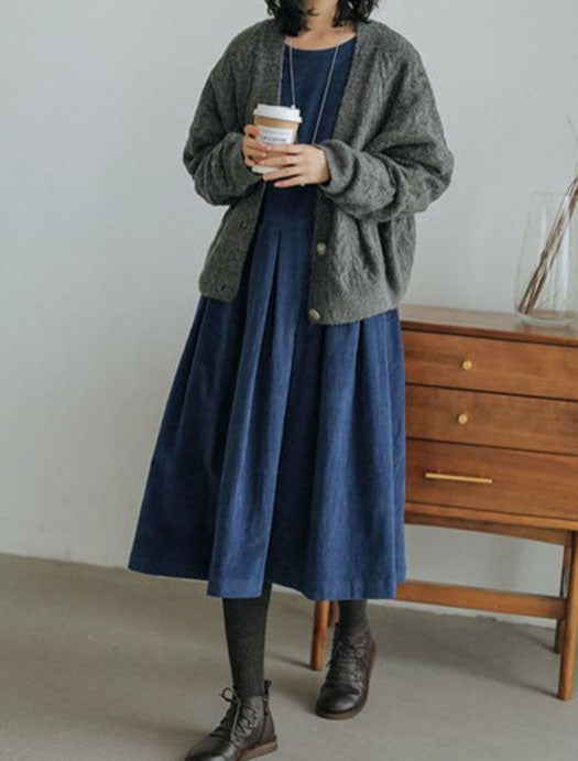 Women's long sleeve maxi dress with a round neckline and gathered full skirt