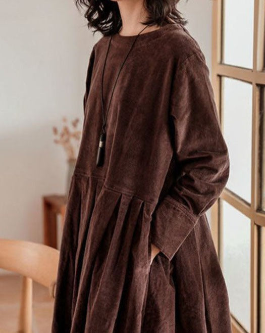 Women's long sleeve maxi dress with a round neckline and gathered full skirt