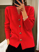 Women's knit cardigan with heart-shaped buttons