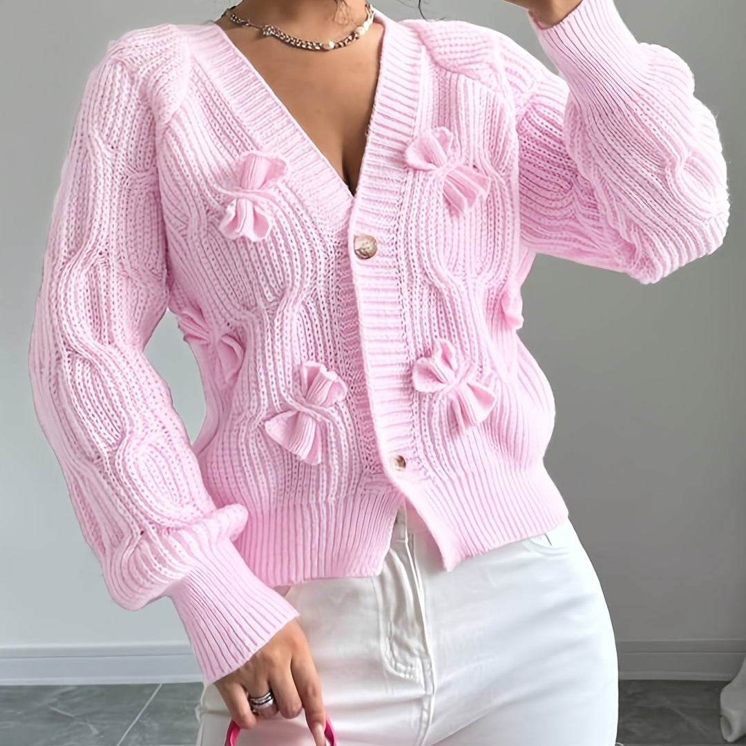 Women's ribbed V-neck cardigan with bow details and button front