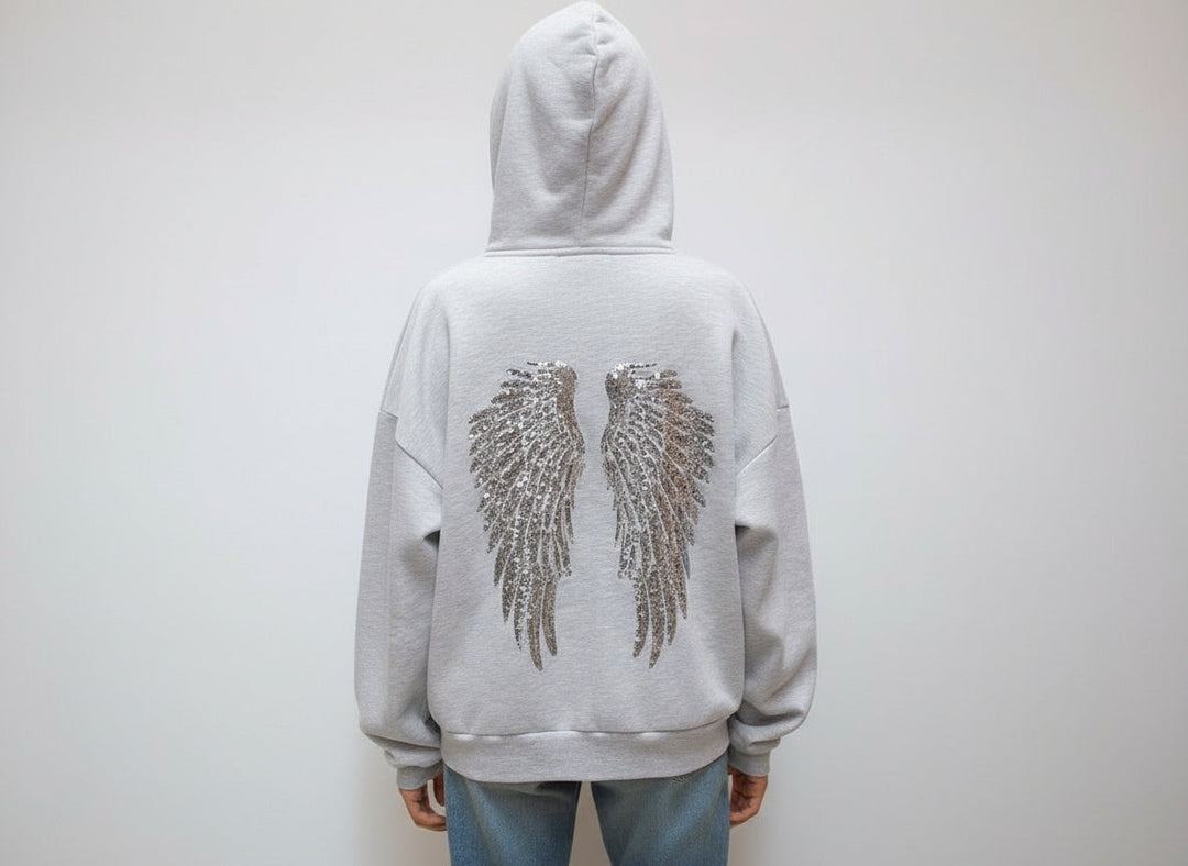 Grey hooded sweatshirt with sequin wings on the back